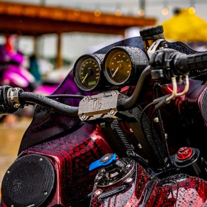 Custom Harley-Davidson pull-back risers and gauges, Quebec motorcycle shop, wet chrome detail