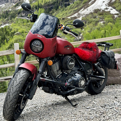 Custom Indian Motorcycle with red fairing, performance upgrades, Lawless Garage Quebec, mountain backdrop
