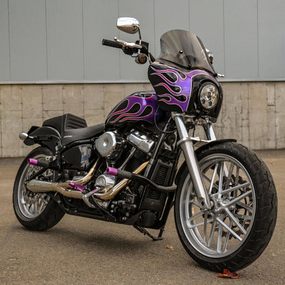 Custom Harley-Davidson Low Rider S with crash bar, highway pegs, purple flame paint, Quebec shop performance upgrades
