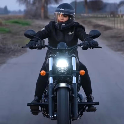 Rider on custom Indian motorcycle with performance upgrades, Quebec Canada, Lawless Garage