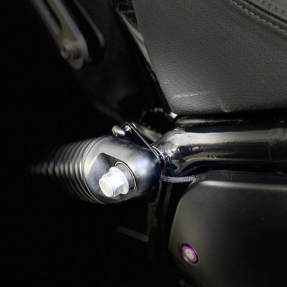 Harley-Davidson rear flasher relocator close-up, custom motorcycle part, Lawless Garage Quebec